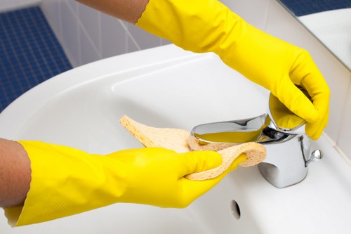 Local cleaners working in a Bermondsey apartment with access challenges